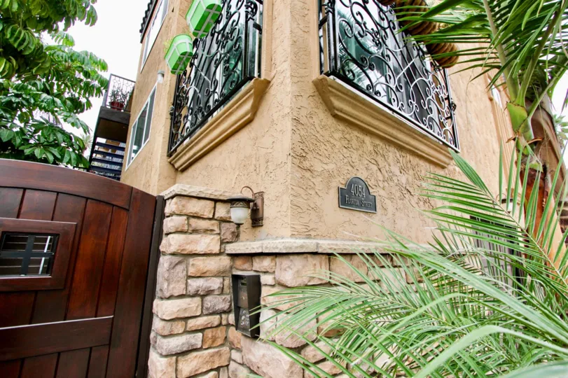 The house in the Florida Terrace with security booth below the light lamp