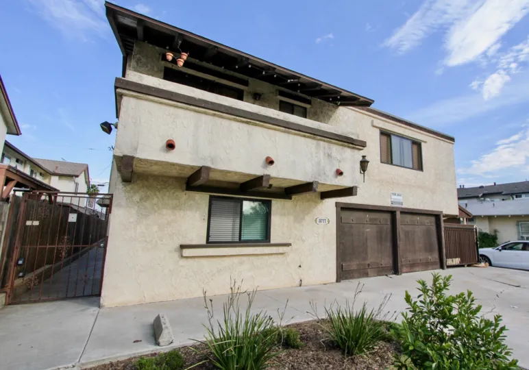 Golden Terrace, North Park, California, adobe, wood, two story