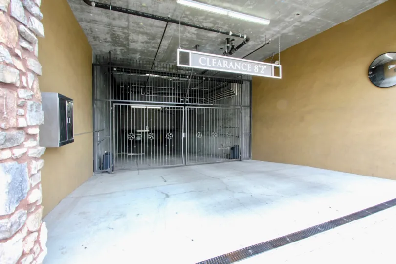 Parking garage entrance gate at a La Boheme community residence