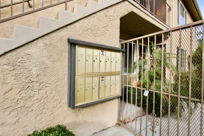 Security gate attached to residential building at La Hacienda in North Park California