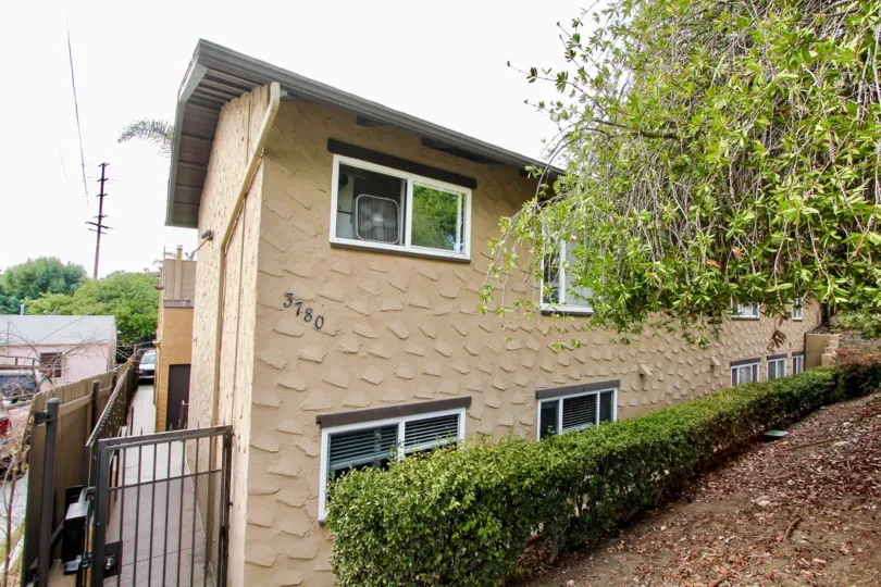 Two story residential units near a hillside at Las Casitas in North Park California