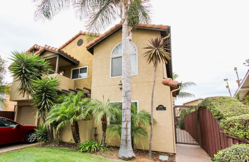 Las Palmas in North Park, California are surrounded by palm trees and gate for your protection and peace of mind