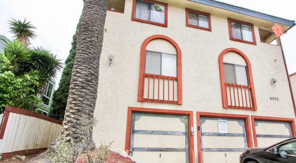 The front of a home number 4033 in the community called Louisiana 8 in North Park, California