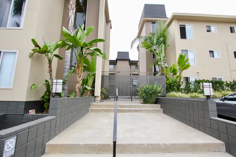On the stairs in view of the Louisiana Condominiums in North Parth, CA