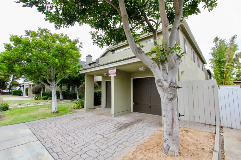Outdoor view of two storey home in Louisiana Village Bayside community, North Park, CA