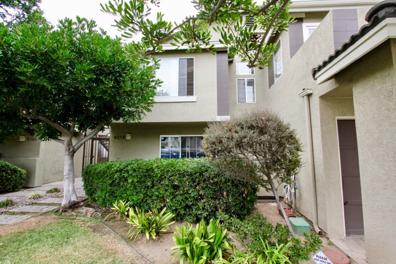 Housing with walkway at Louisiana Village Bayside in North Park California