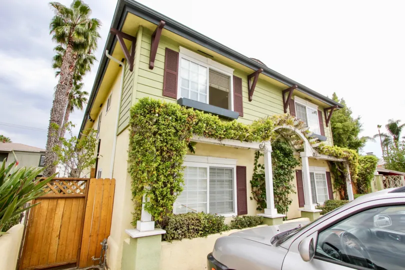 Vine covered home in beautiful Magnolia Walk Community of North Park