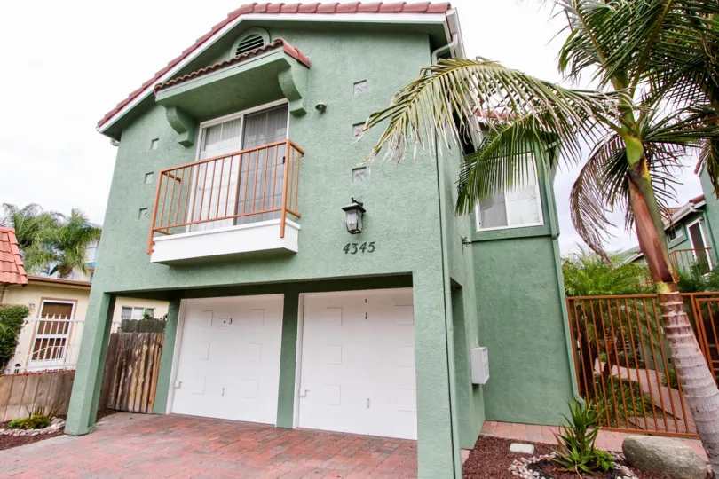 Shaded portico with garage and mini balcony in Majestic Palms.