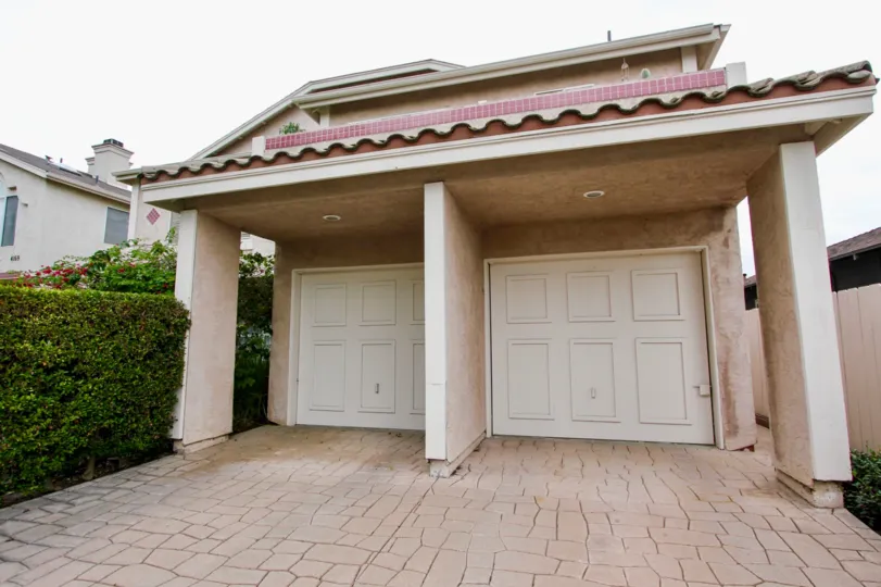 Lovely home is Mardi Gras Villas with custom drive way in North Park California