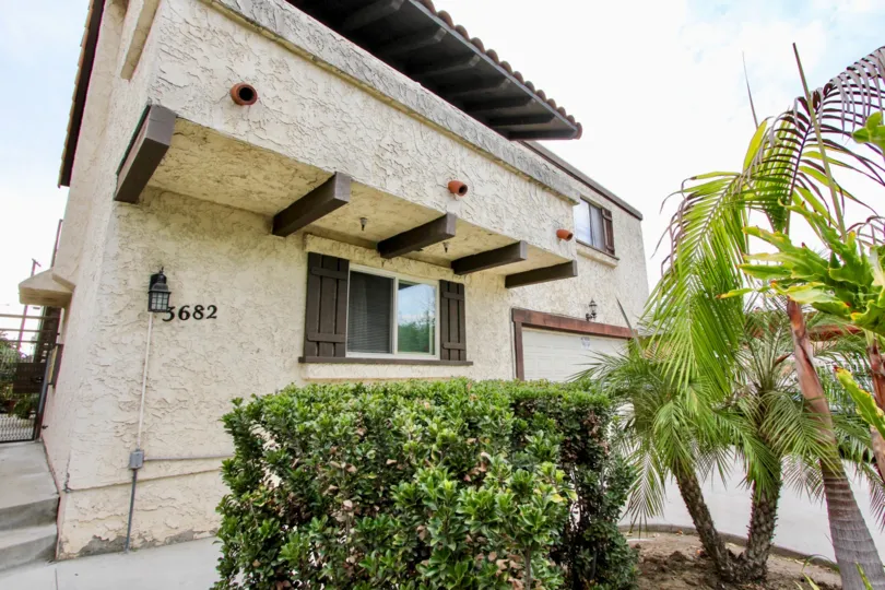 Nile Street Condos , North Park ,: California, cream colour building, plants