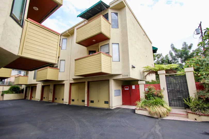 North Park River Oaks  , North Park ,California,beige building,plants