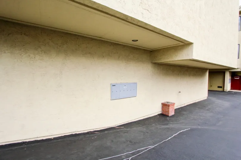 Driveway near the base of a residential building at North Park River Oaks in North Park California