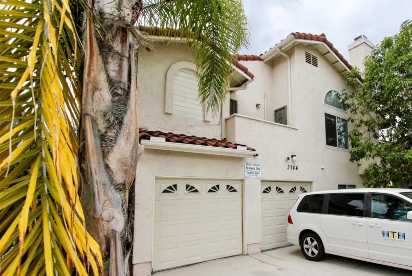 Omega II  ,North Park,California,off white building,trees
