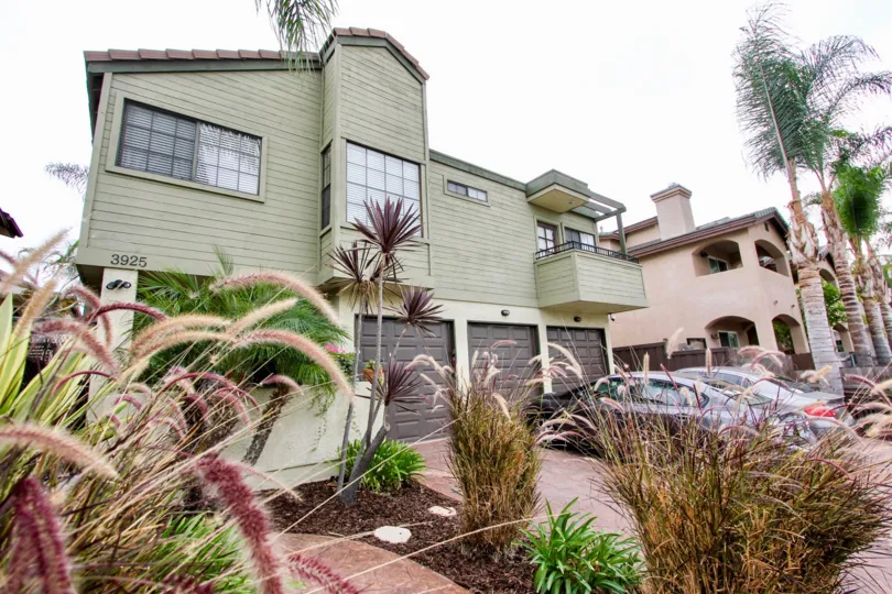Oregon Street community North Park California decorative grass landscaping garage off street parking balcony tile roof large windows palm trees