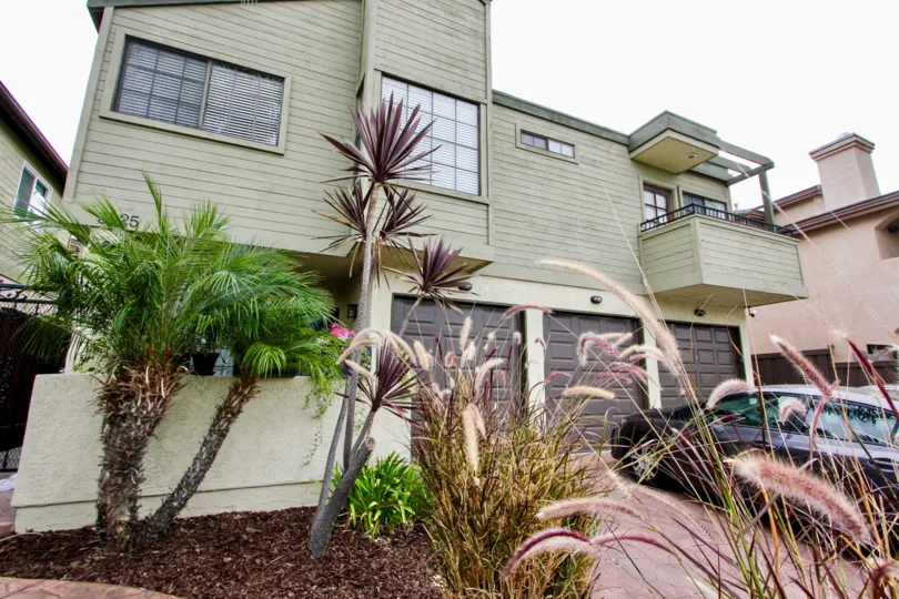 An apartment complex in North Park with a three car garage