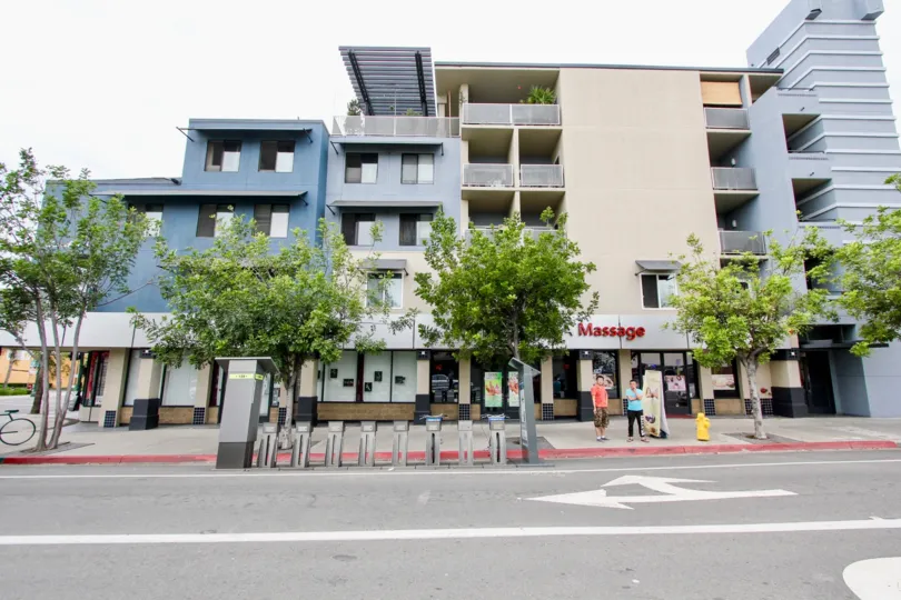 A street view of some small apartment buildings in the Palisade Gardens area of North Park, California