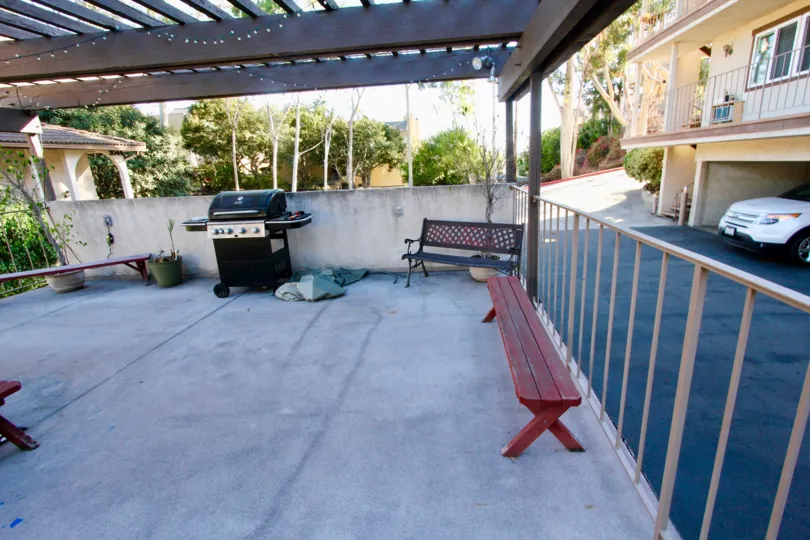 Robinson Street, North Park,: California,maroon bench,car