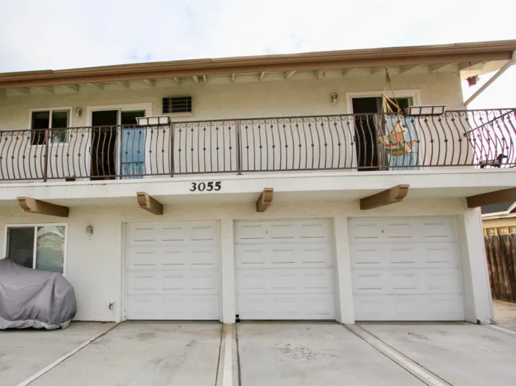 In the Balcony of the South Park Villas with swing and bike is parking in the ground