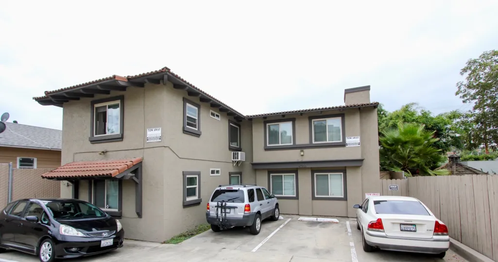 Front of residence with four parking lots in the Sunburst Court