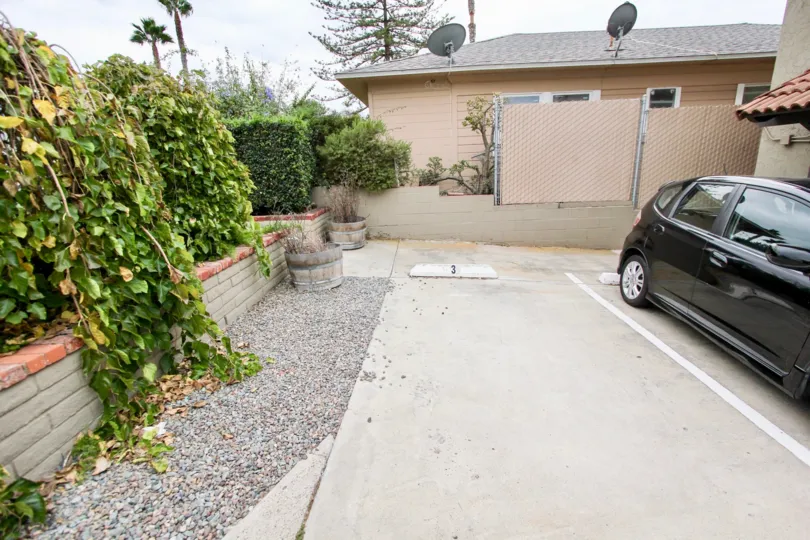 Parked car near residence at Sunburst Court in North Park California