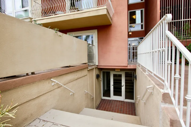 The lower level entrance to a beautiful multilevel building in Sunset Villas in North Park California.