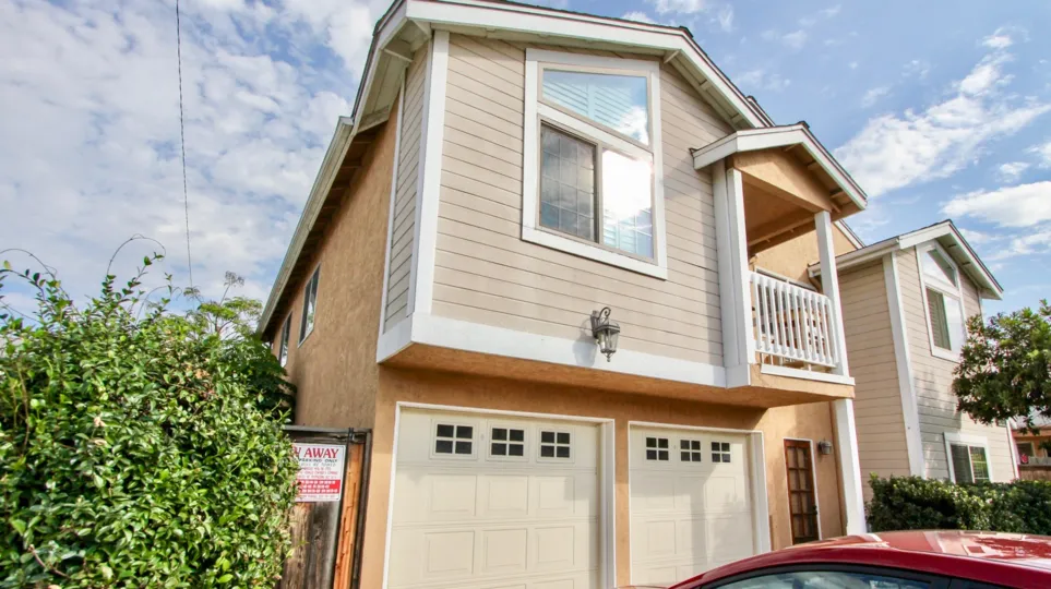 A two story structure with parking garages in the Swift Colony community in North Park, California