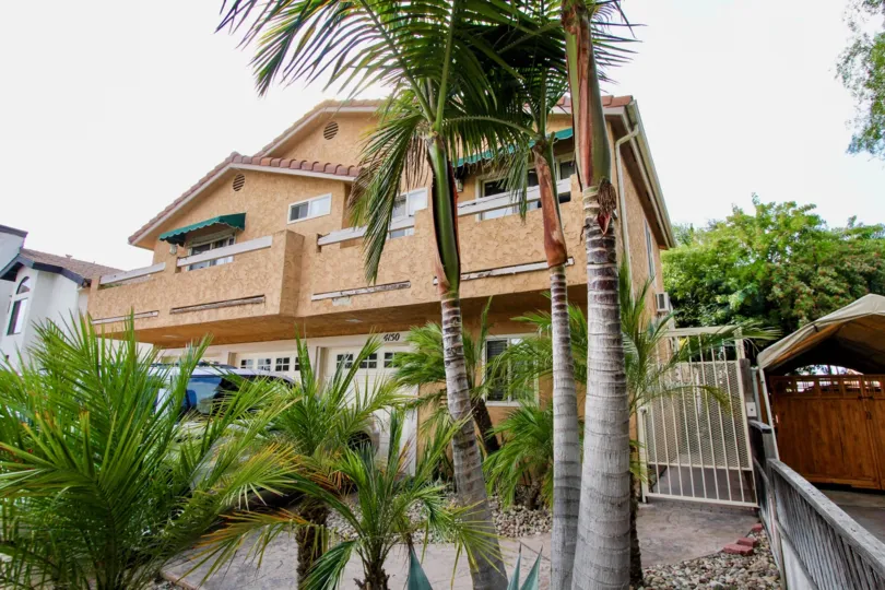 Teralta Bulding have a beautiful front view with trees and plants with Front car parking