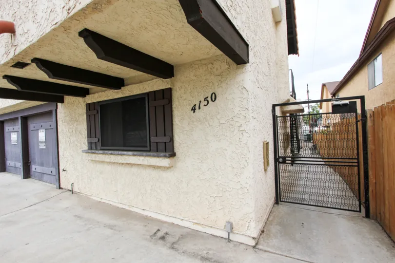 Wooden beams decorate the overhang at The Almo condos