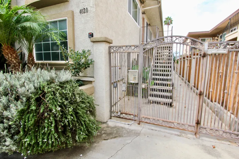 A gate next to a house in the Garden District in North Park, California