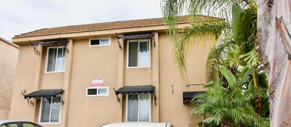 A yellow apartment complex from The Sedona community in North Park, California