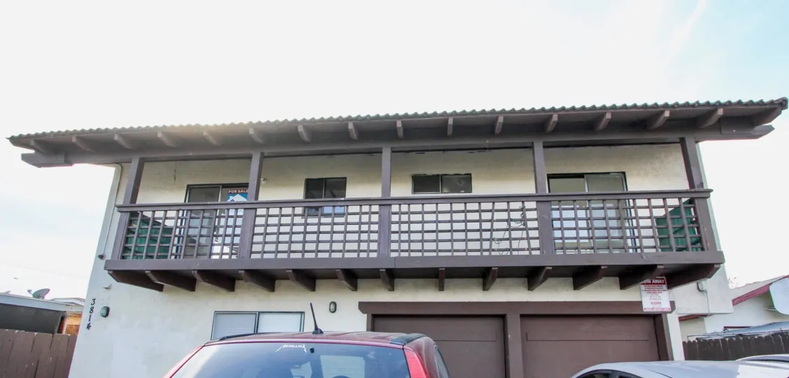 A large balcony of a cream colored unit, 3814, located in Triton Condos of North Park, California