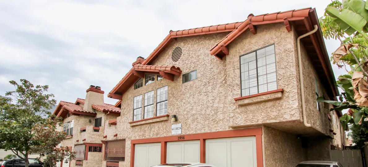 House in Utah Park II, North Park CA  Stucco sides and 3 garage doors