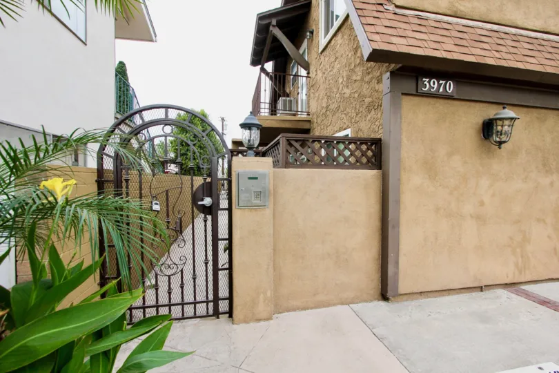 Unique brown aptarment, 3970 address with gated entrance to home