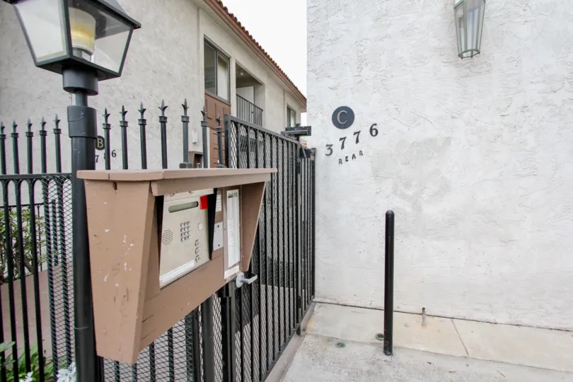 An intercom box allows entrance to the rear of this residence in the Villa Sao Miguel community.