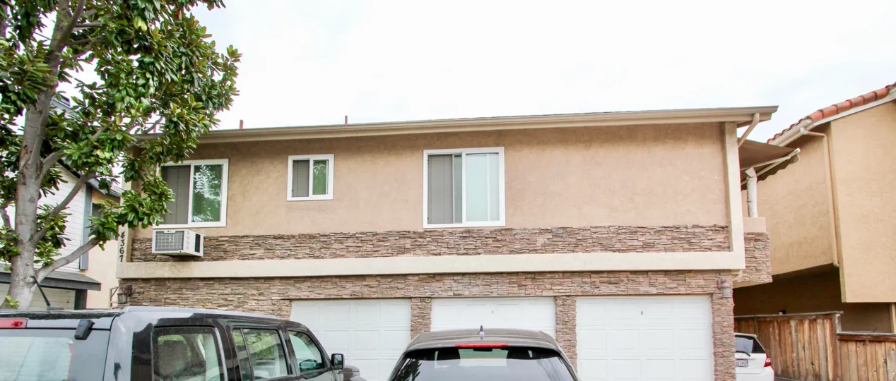 2 Story brick and stucco home with 3 car garage in Villas on Idaho Community of North Park, California