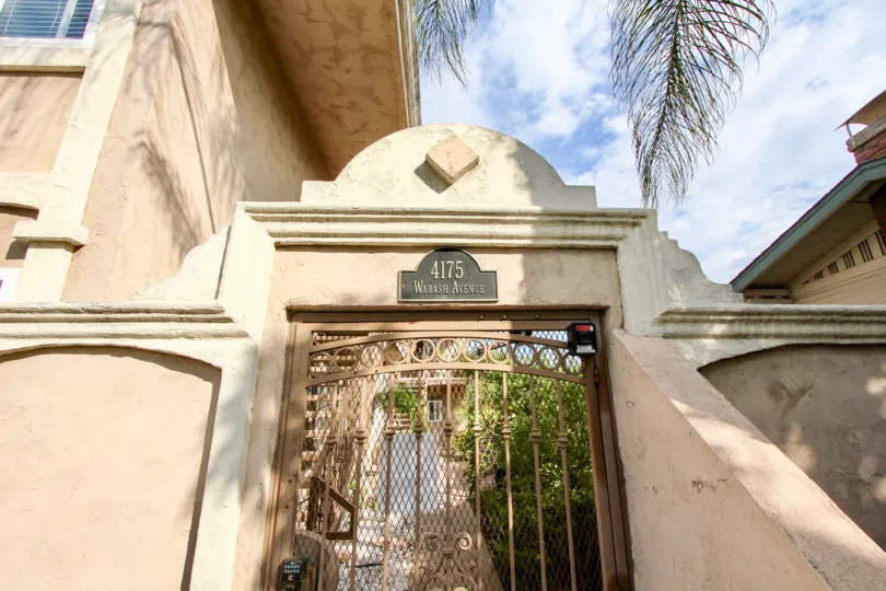 The gate entrance to a complex in Wabash Gardens North Park CA.