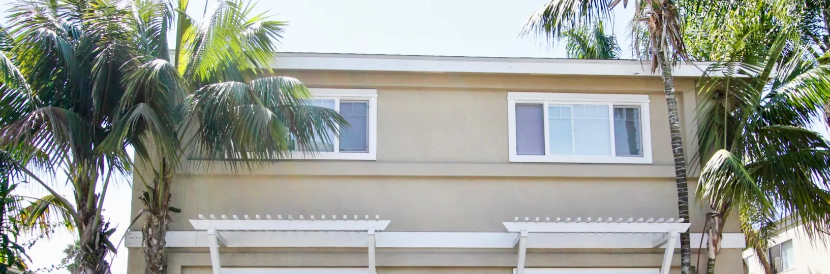 Beautiful and scenic homes surrounded by stately palms at 4841 Del Monte Ave, Ocean Beach, California