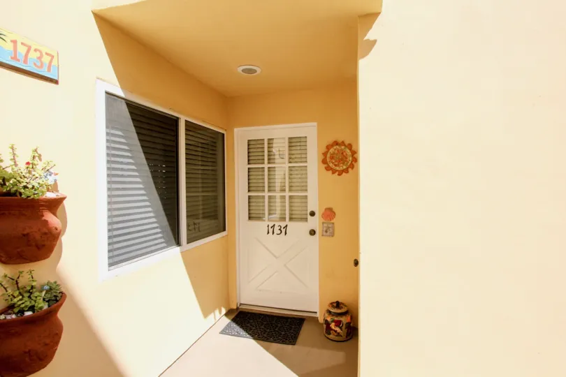 White door with many smaller windows at the Cliff House in Ocean Beach CA