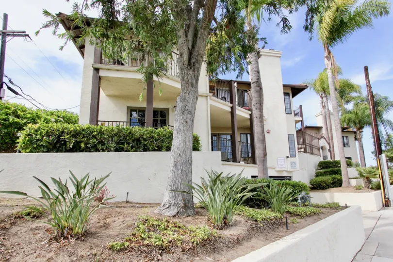 Famosa Terrace in Ocean Beach, California, Side Entrance, Lovely Balconies and Foliage