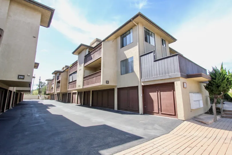 Well maintained backlane with double and single car garage units at Harbor Villas