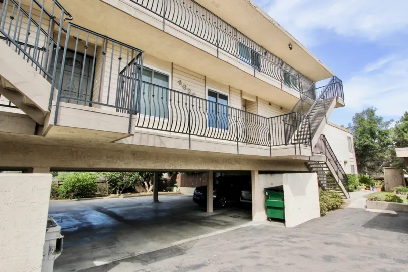 An apartment with open parking in Loma Dunes village.