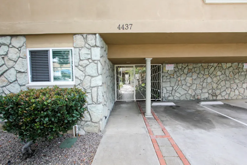 An empty parking space of a house in the Mentone Villas community.