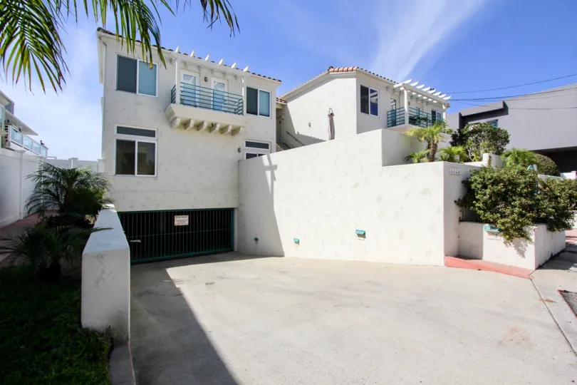 Private parking entrance at Ocean Park Condos in Ocean Beach, California.