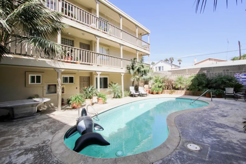 Kids can play in the pool while you relax in the shade at Oceanus.
