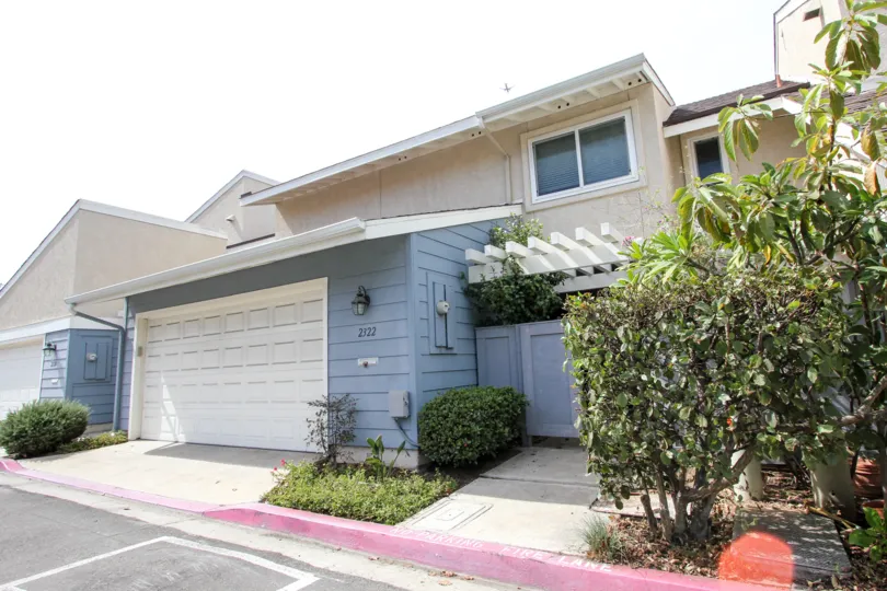 Charming cottage exteriors of Park Point Loma community.