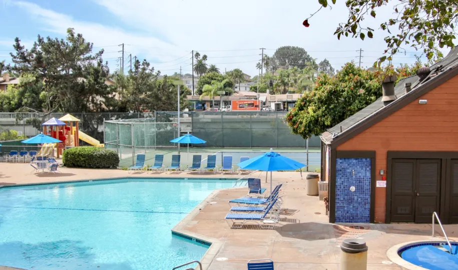 In Sea Colony, Swimming pool for child, adult and chair with umbrella are present