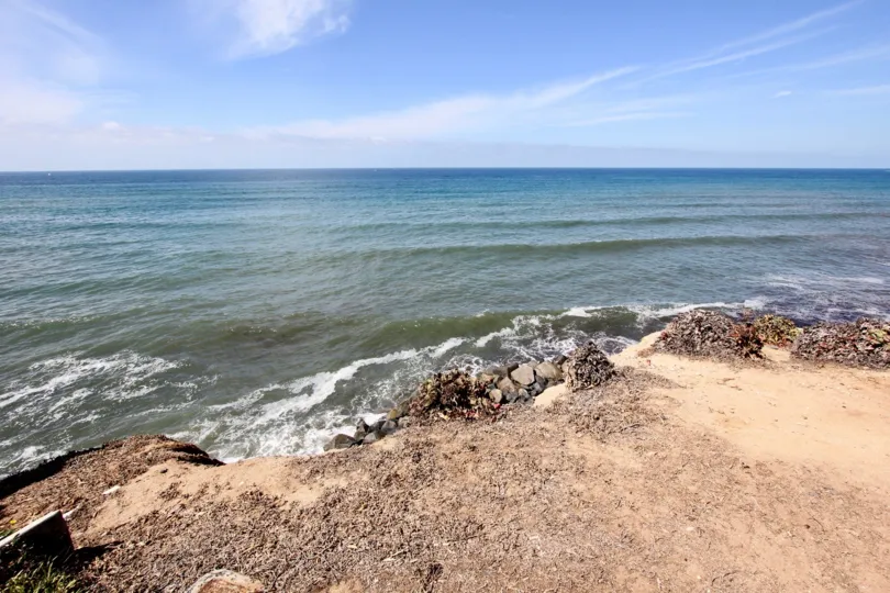 A very peaceful beach in Sunset Towers showing beautiful waves.
