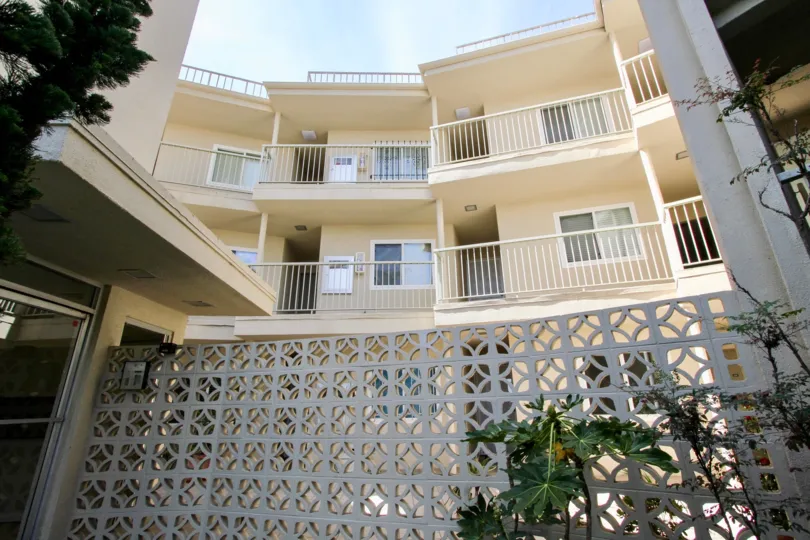 Sunset Towers are tan building in Ocean Beach, California.