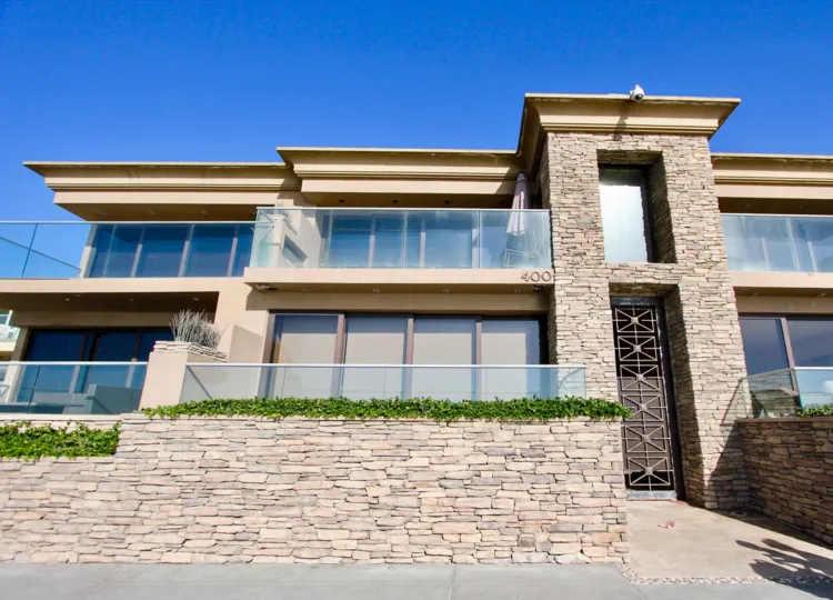 Lots of sunshine and windows at this two level home at 400 S The Strand