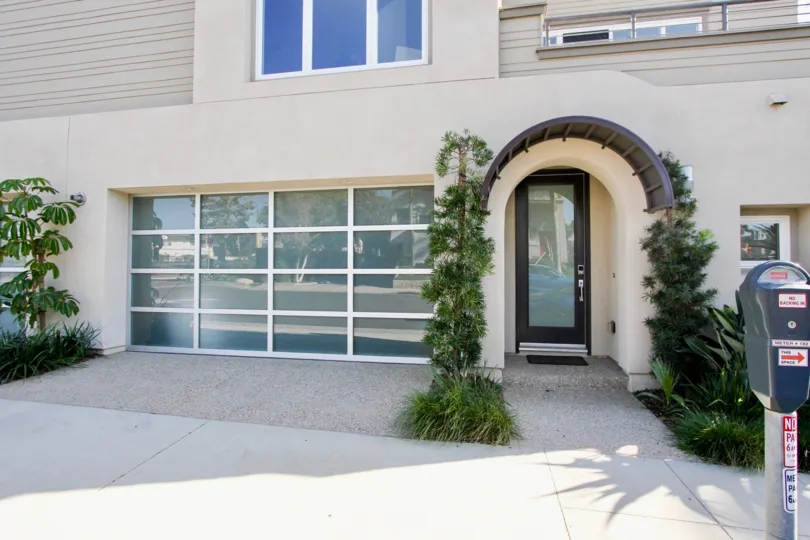 Azure Del Mar, Oceanside, California, off white building, glass door